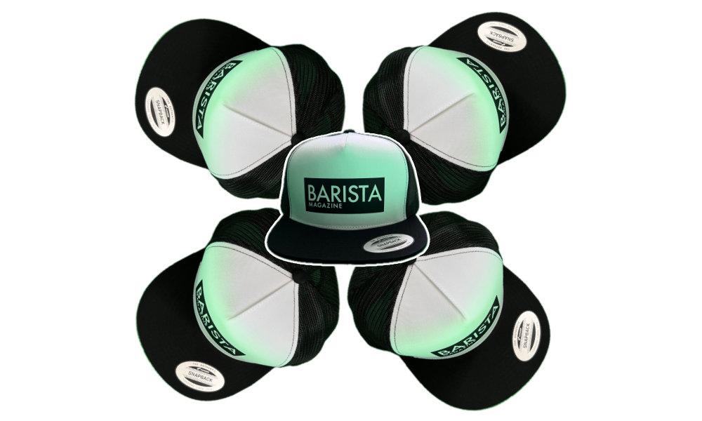 Set of black and white trucker caps with 'Barista' branding on a white background