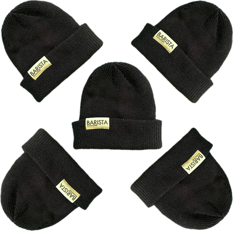 Set of five navy beanies with 'BARISTA' label on a white background